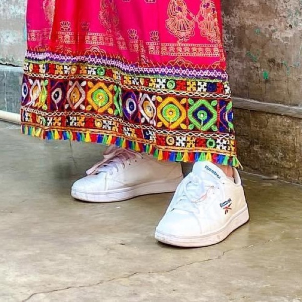 Reebok White Trainer Sneakers with blue and red accents